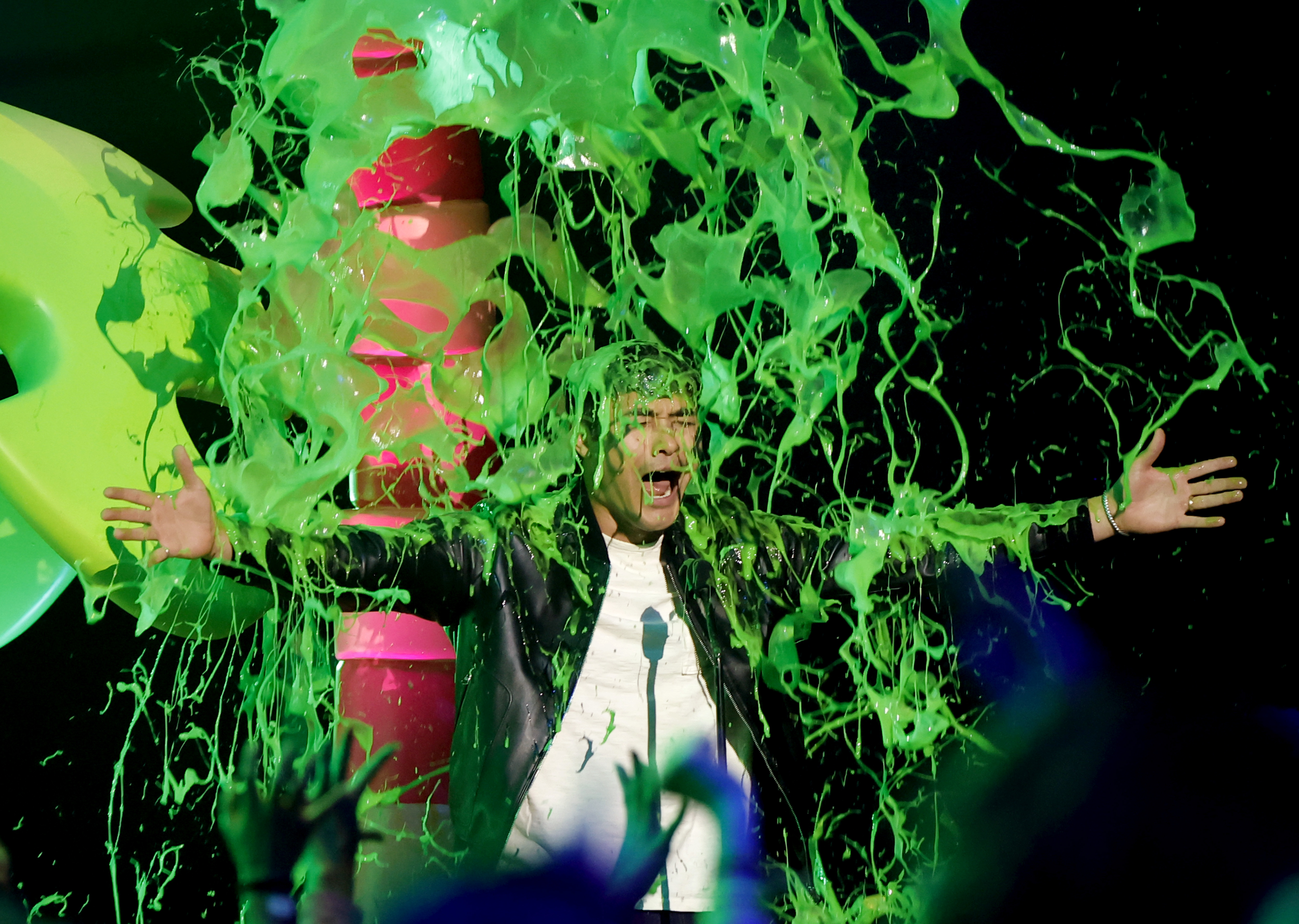 	Getty Images for Nickelodeon/ Henry Golding gets slimed at KCA24